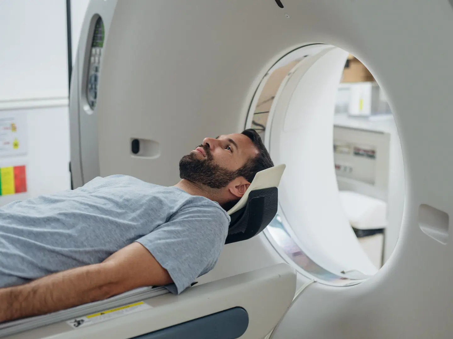 Patient Lying On The CT Scanner